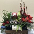 Christmas arrangement with a bottle of wine