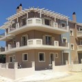 Three-storey building with ground level garage