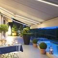 Awnings with a folding arm with LED and Somfy mechanism