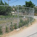Ground fencing with upper metal frame