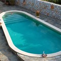 Private skimmer pool mosaic tiled in Leftktro Messinias
