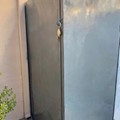 Προσθήκη πόρτας σε στέγαστρο για χρήση κλειστού αποθηκευτικού χώρου