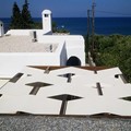 Installation of double waterproofing sailcloth strips with alternating directions on a wooden pergola