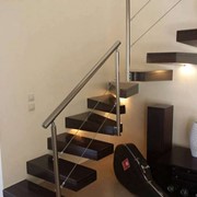 Interior stairs with Inox-type banister rails