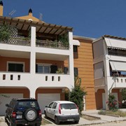 Three-storey building with ground level garage