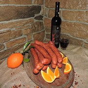 Λουκάνικα χωριάτικα με πορτοκάλι