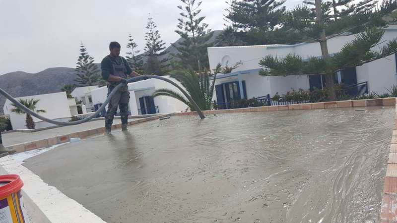 Flat roof water flow constructions with foamed concrete