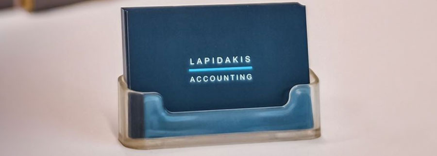 LAPIDAKIS ACCOUNTING logo