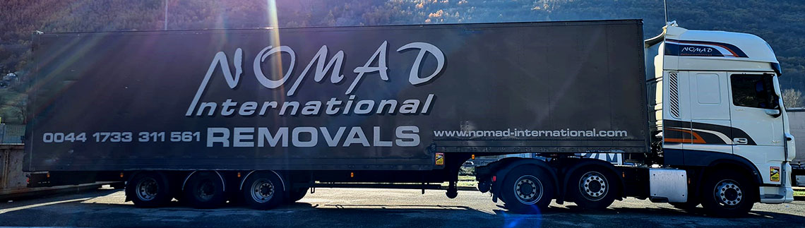 NOMAD INTERNATIONAL GR logo