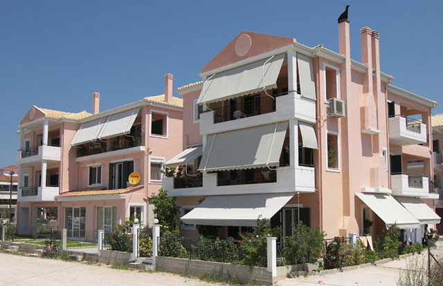 Three-storey building with ground level garage