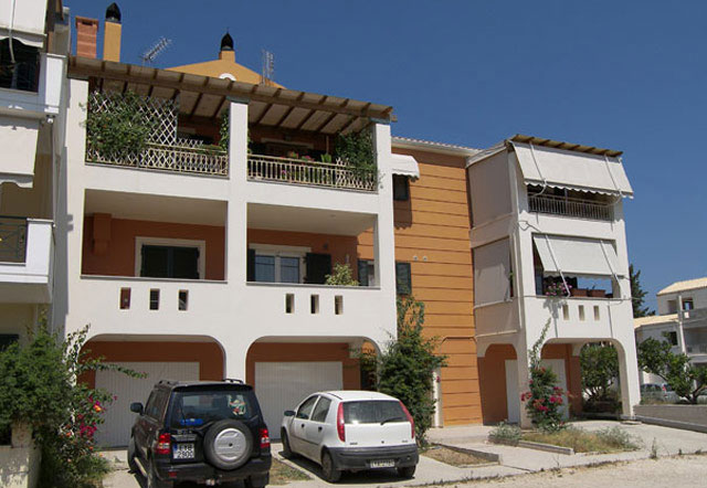 Three-storey building with ground level garage