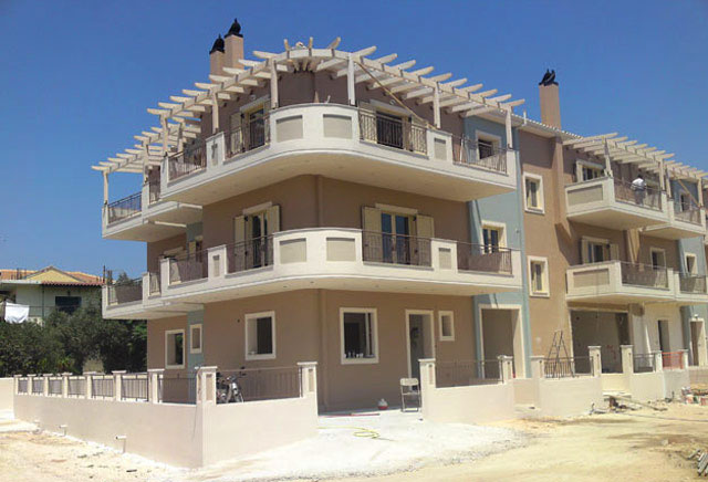 Three-storey building with ground level garage