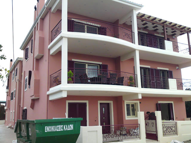 Three-storey building with ground level garage