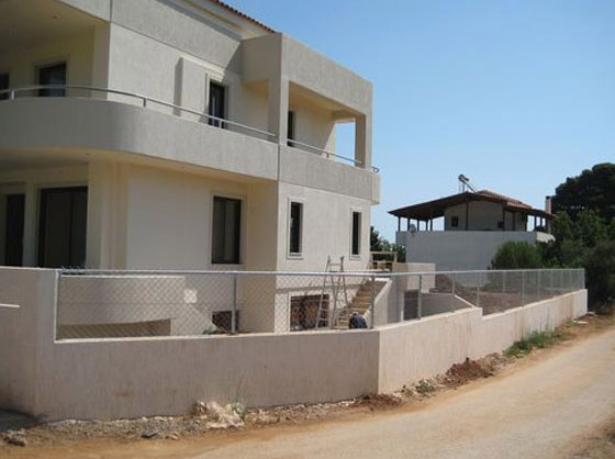 Concrete fencing with upper metal frame